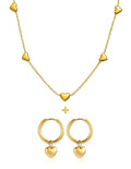 Gold necklace and hoop earrings with heart pendants on a white background