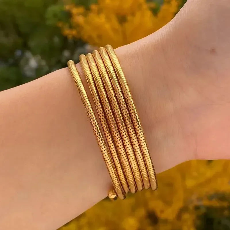 Sleek Spiral Gold Bracelet - Diatoms