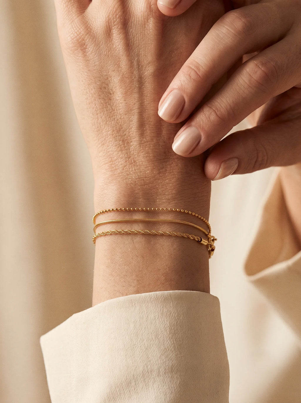 Three Sleek Chain Gold Bracelet