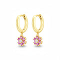 Gold hoop earrings with pink and clear gemstones on a white background