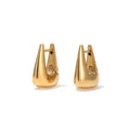 Pair of gold earrings on a white background